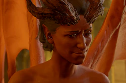 A picture of Haarlep in the boudoir of the House of Hope. They are in the feminine form, with a wry look of anticipation on their face as they attempt to seduce the player character.