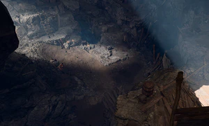 Screenshot looking down into the cave on the Risen Road