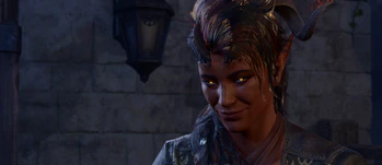 A picture of Karlach at The Singing Lute. She is having a date night dinner with the player character and the smile on her face shows she is enjoying the company.